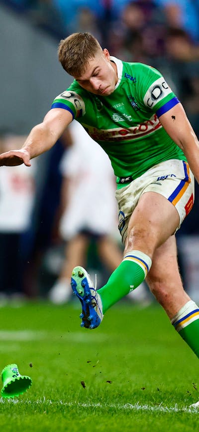 Canberra Raiders player Ethan Sanders kicking a conversion.