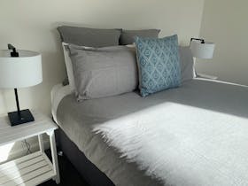 Linen bedding in main bedroom