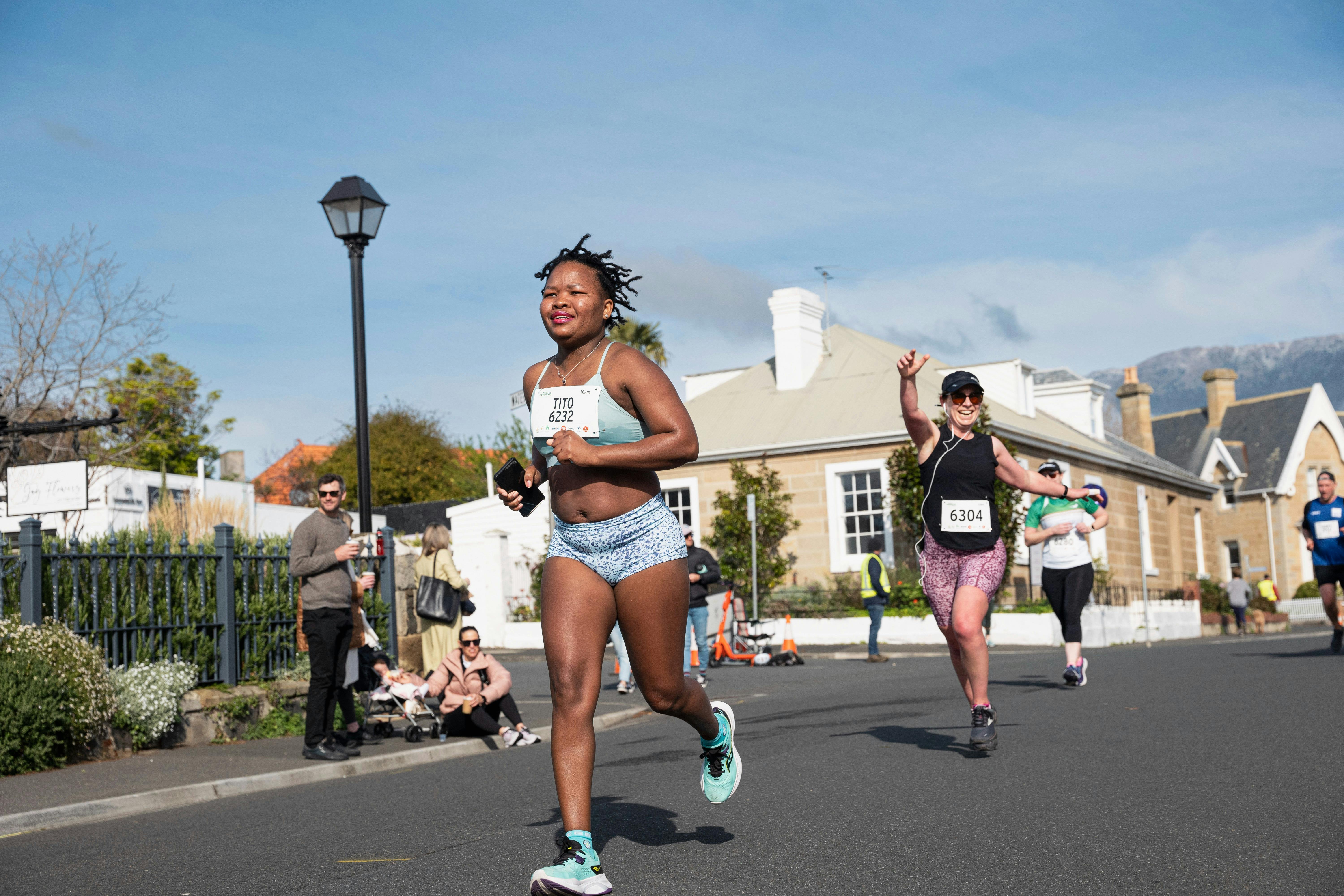 Runners running on the road in Battery Point