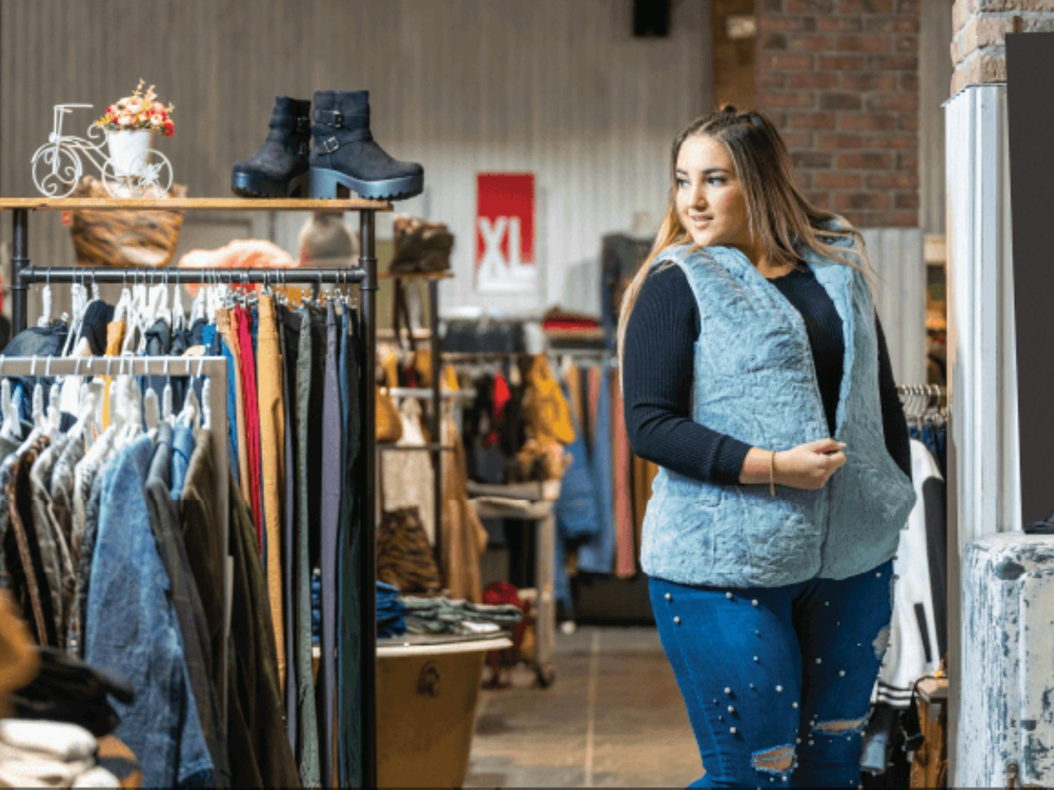 Image of a woman shopping for clothes
