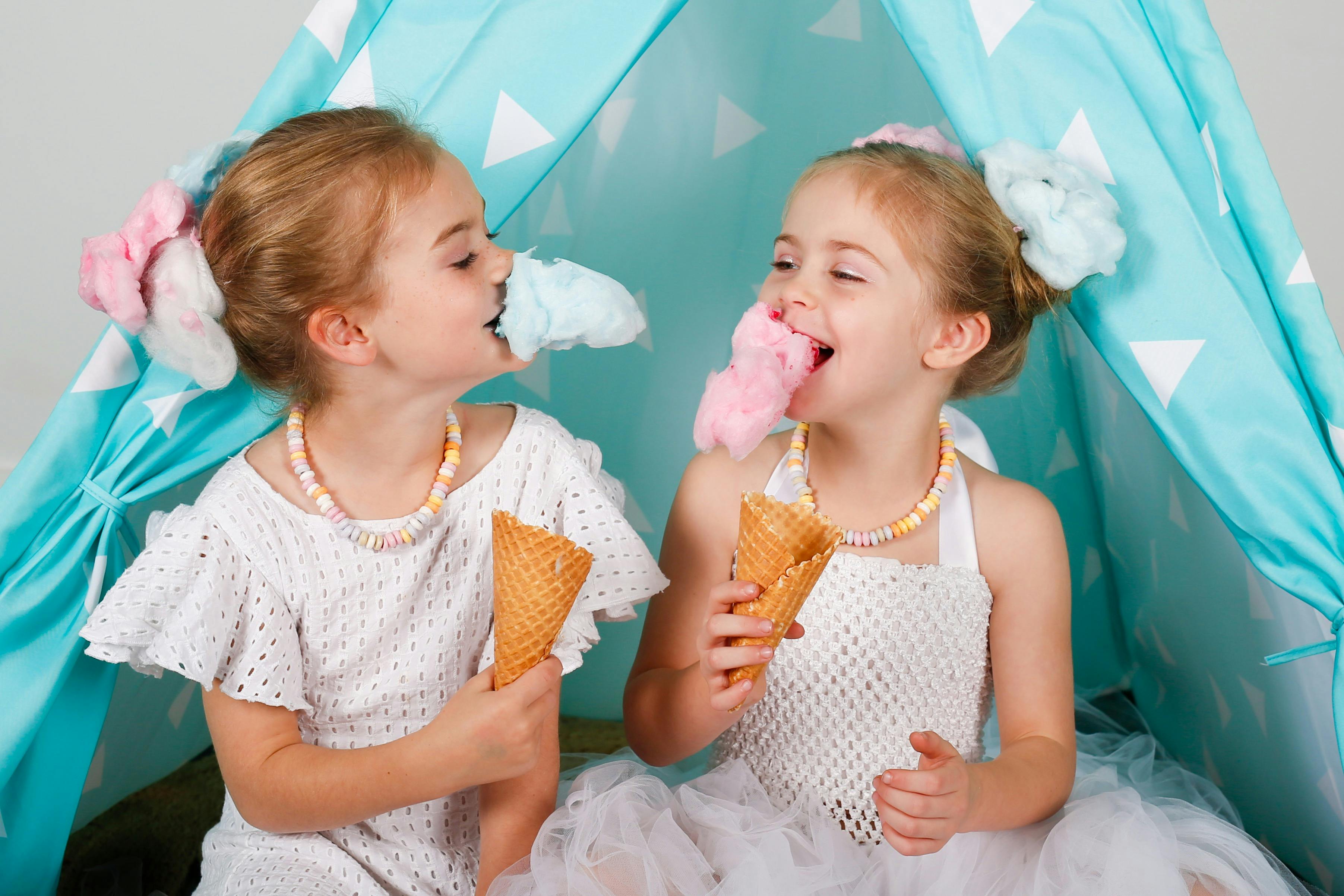 Girls eating fairy floss