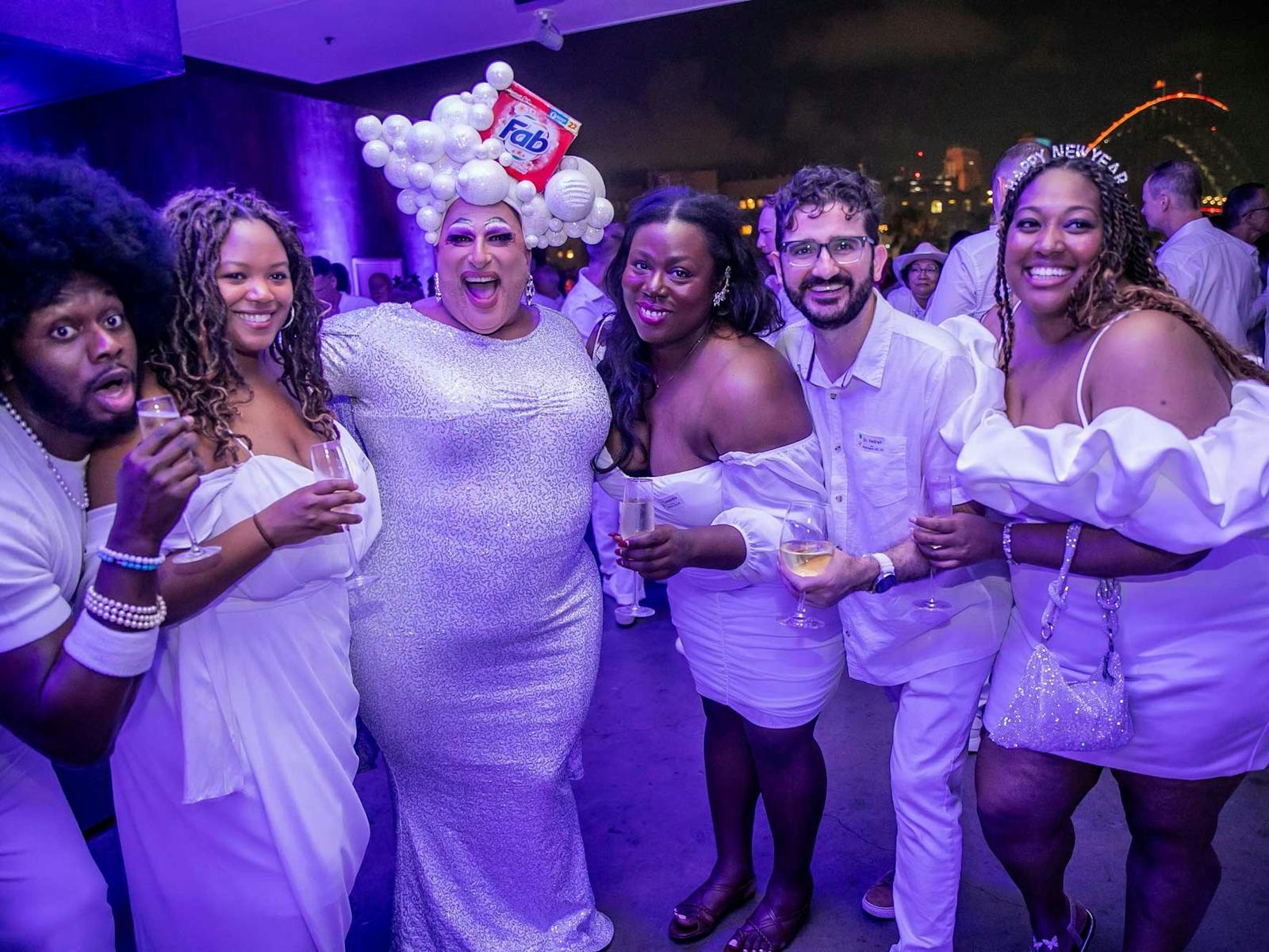 Frock Hudson and International Guests all in white.