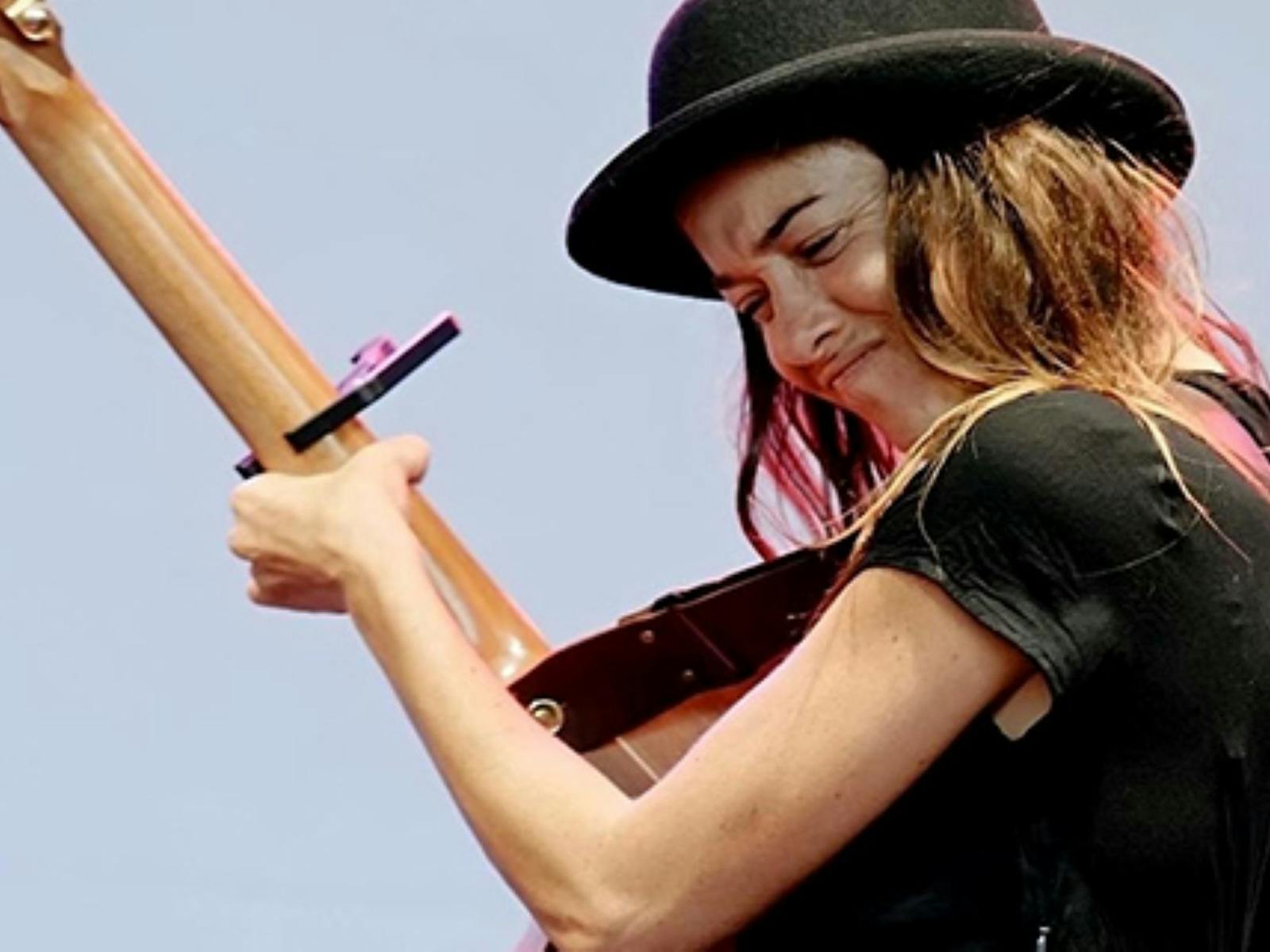 Image of a female guitarist