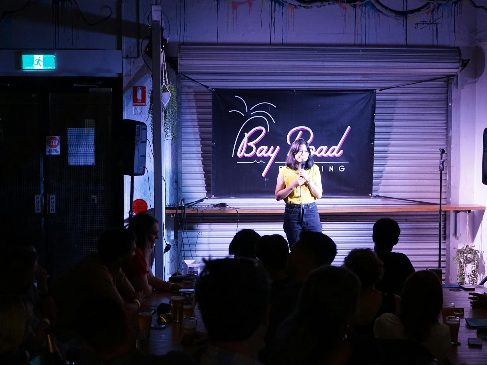 Comedian Thao Cao perfoming in the Secret Comedy Club show at Bay Rd Brewing, Gosford