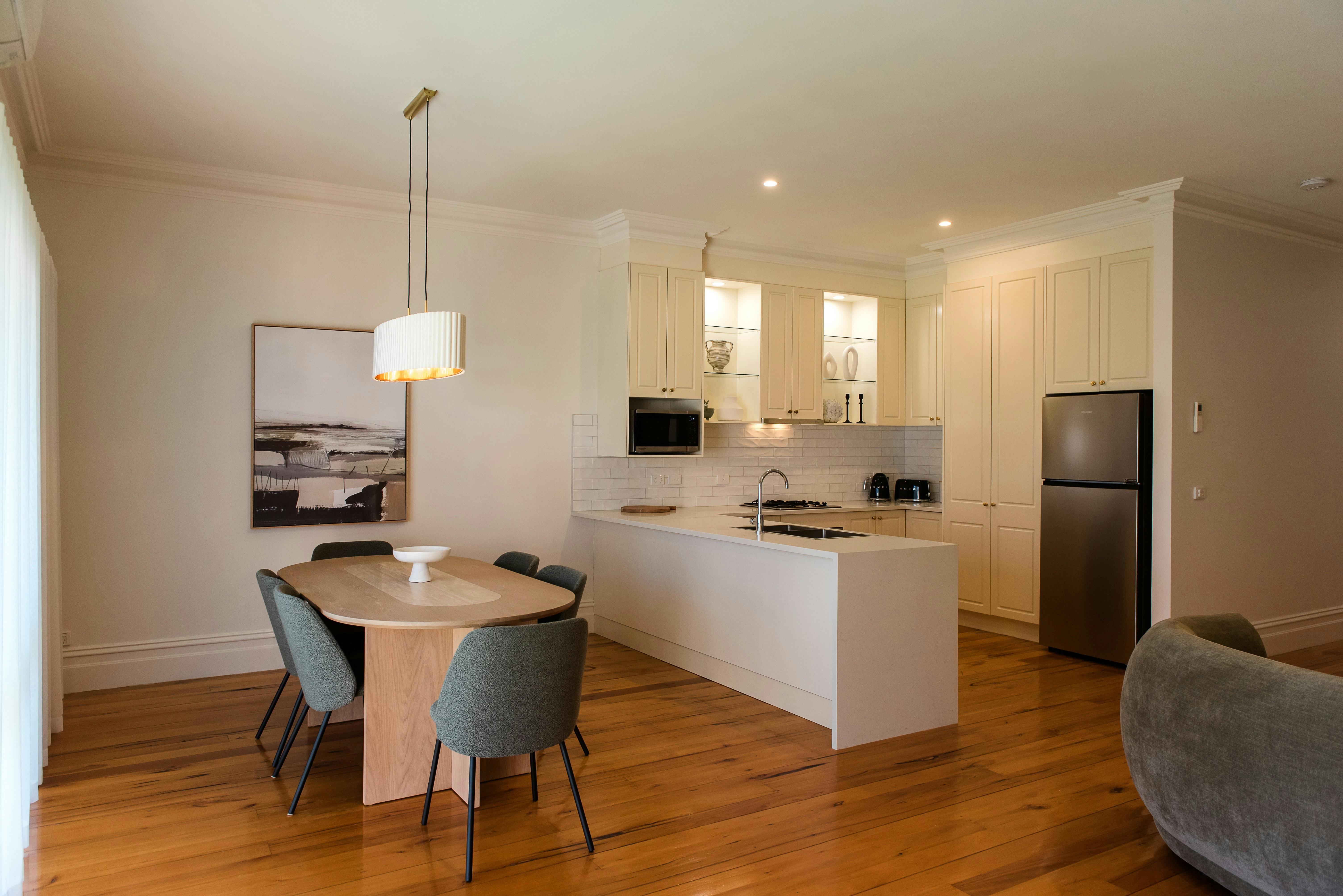 Renovated cosy dining room and kitchen in three bedroom townhouse in Wangaratta