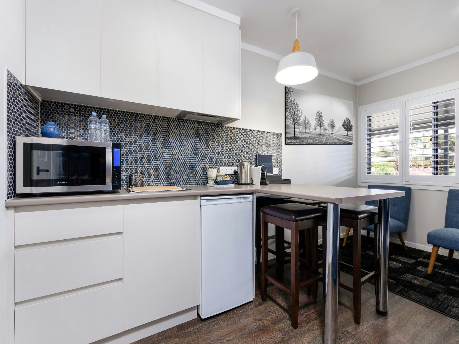Kitchenette in our Deluxe 2 bedroom unit, complete with Nespresso coffee machine