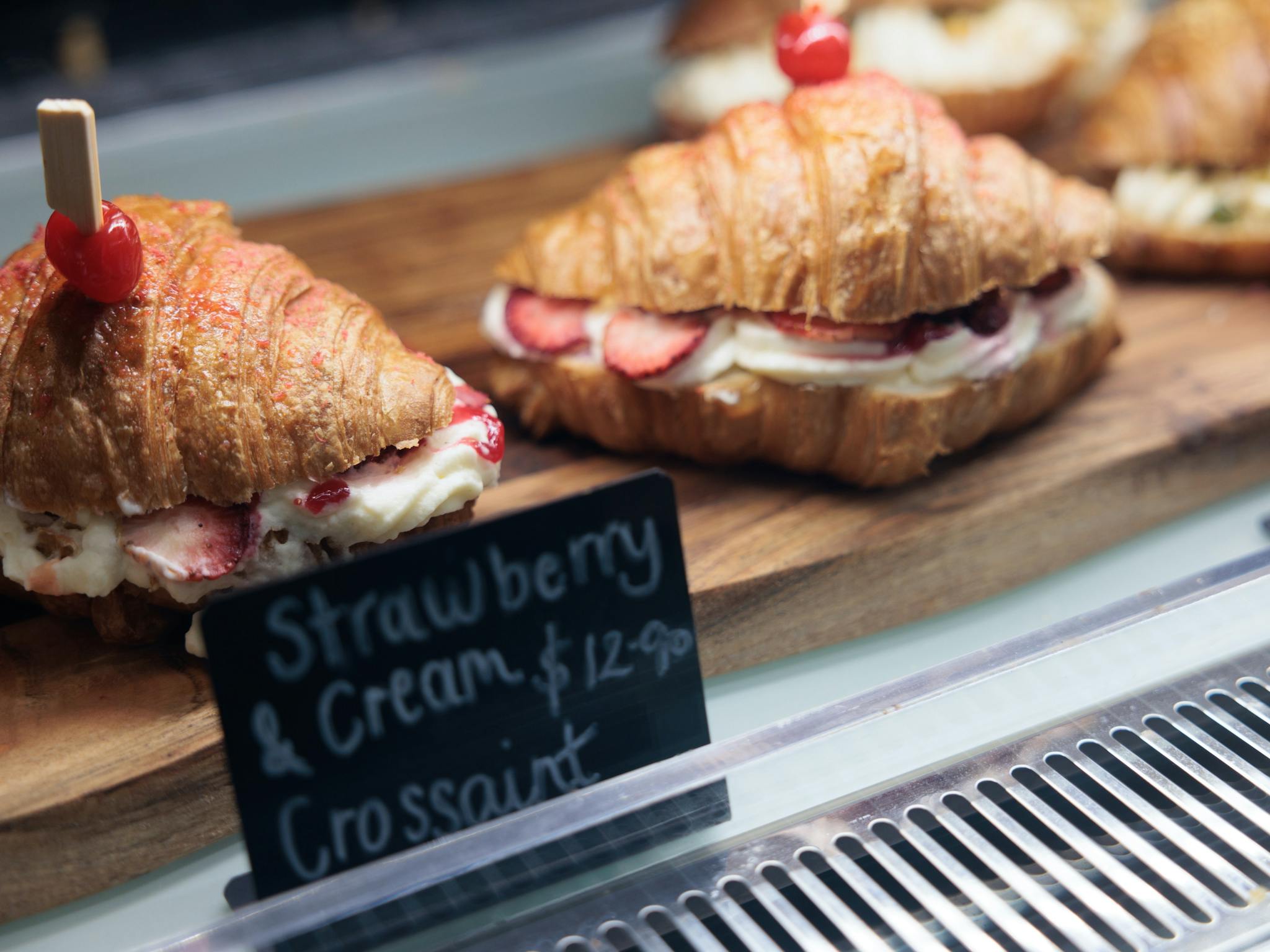 Image of croissant in pastry cabinet