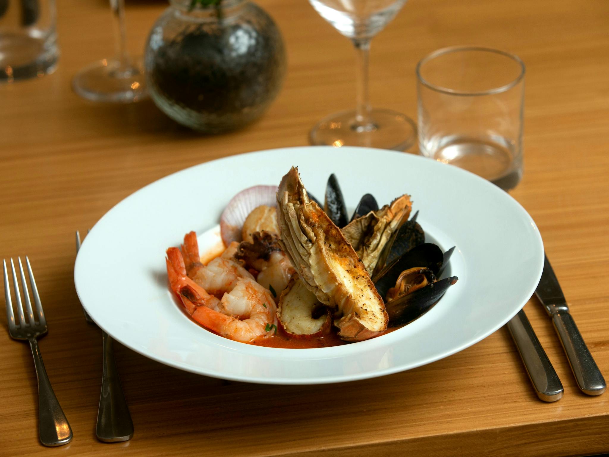 Slipper Lobster, Prawns, Mussels, Scallop, Calamari Cooked in Tomato chili Kombu Sauce and Bread