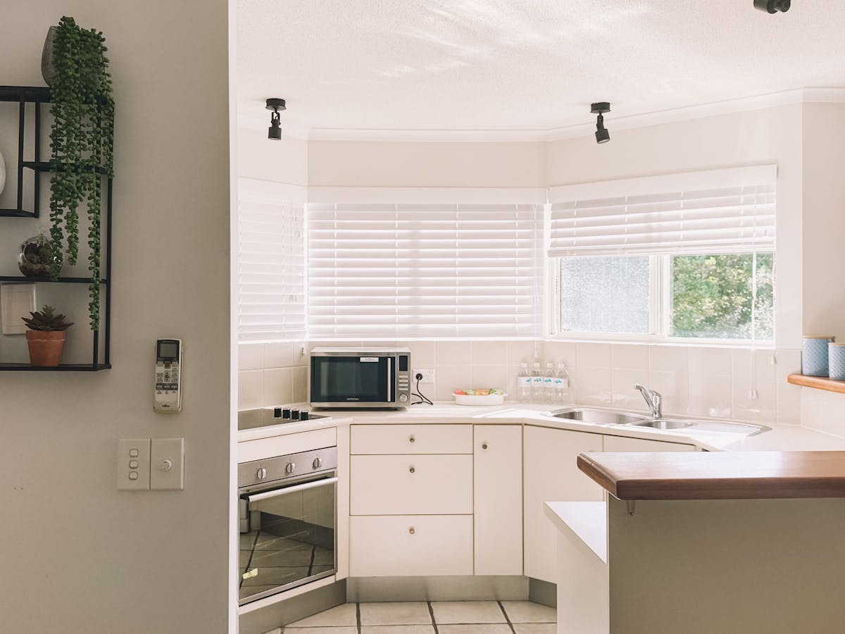 Open plan kitchen, spacious, view on terrace and sunshine beach ocean Open plan kitchen, spacious, view on terrace and sunshine beach ocean