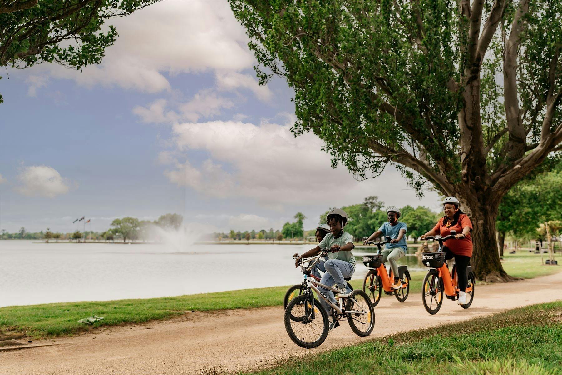 Family cycling around Lake Wendouree