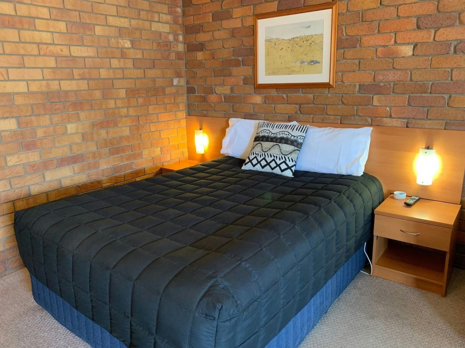 Bedroom at Peter Allen Motor Inn