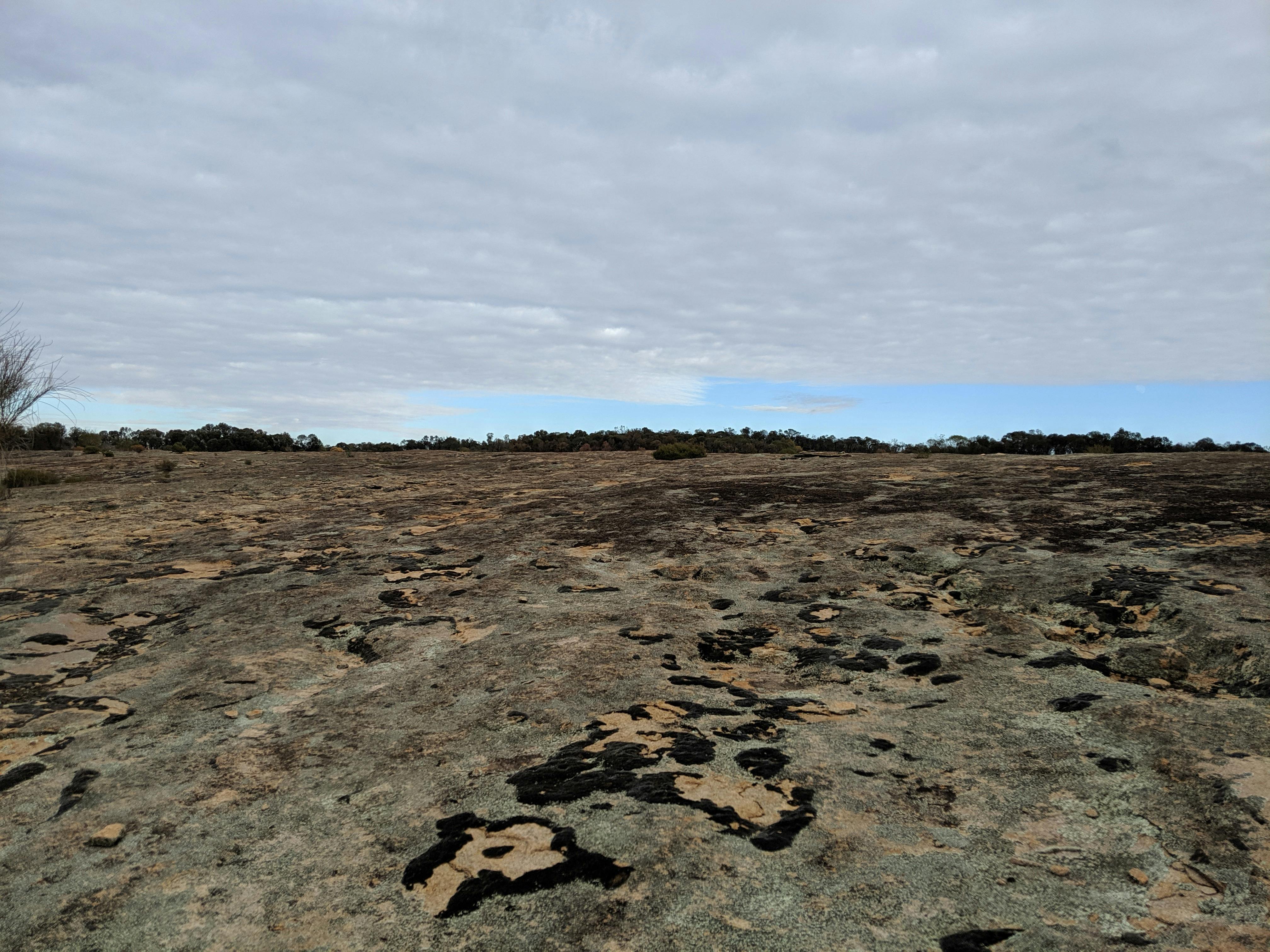 Large granite rise, pitted with water collection holes