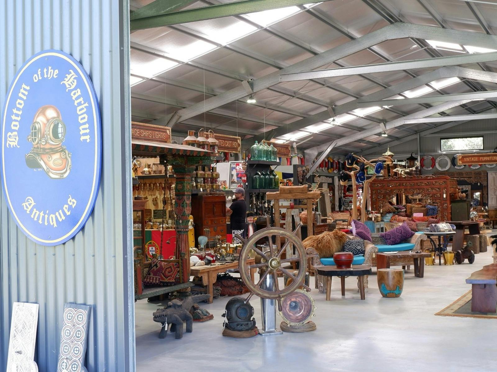Looking into the Bottom of the Harbour store. A big shed filled with vibrant colours and antqiues