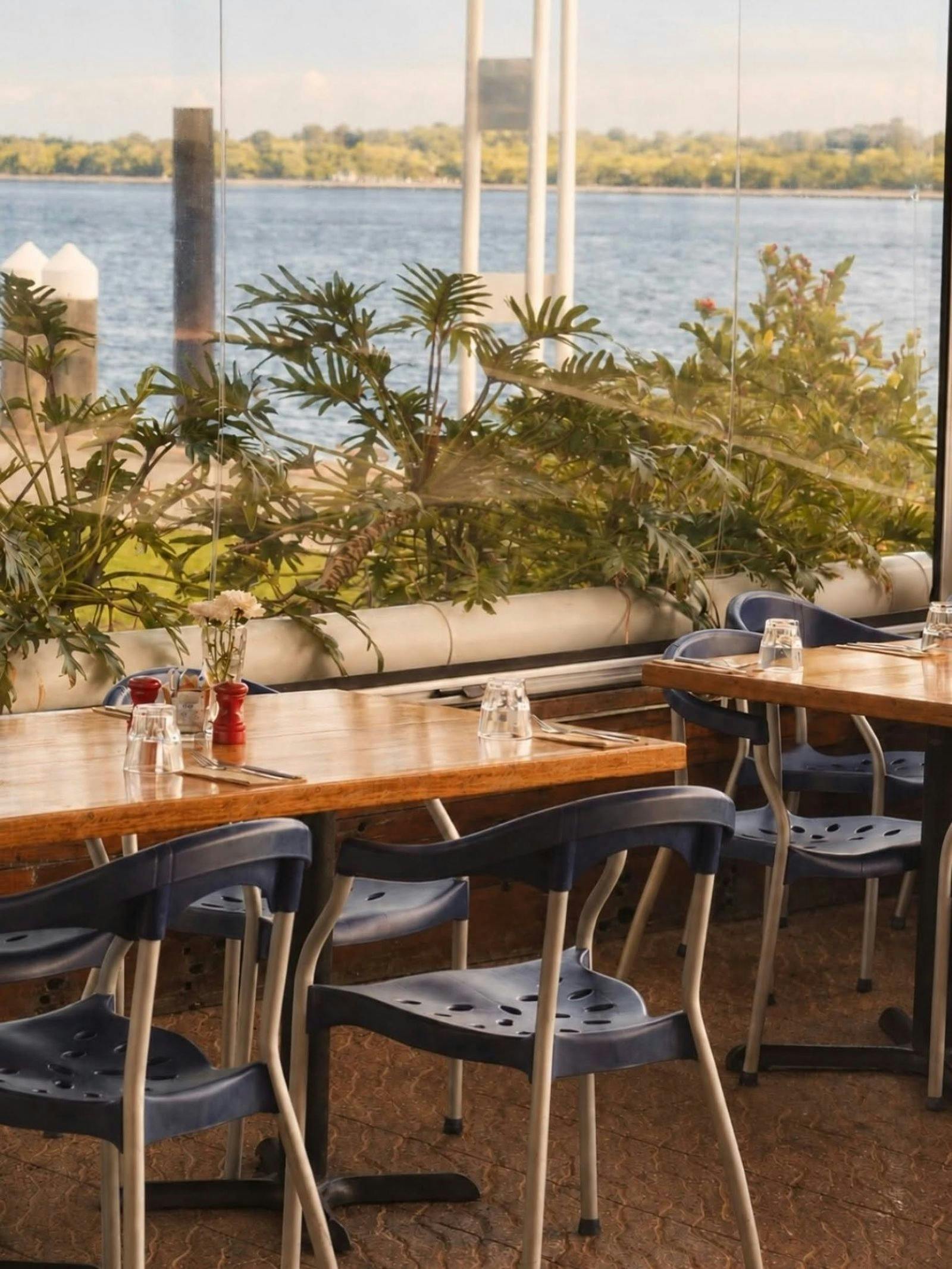 tables with river in background