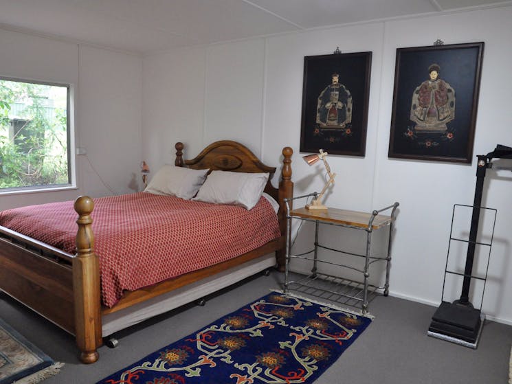 Queen size bed at your Nelligen accommodation