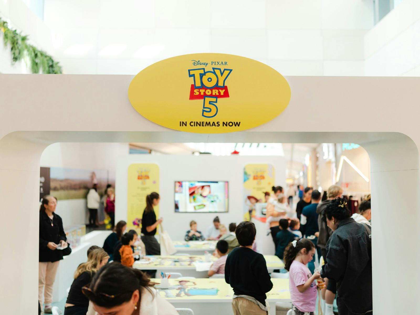 wide shot of kid inside activity station