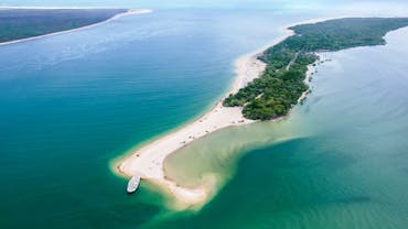 Aerial Shot of Inskip Point with cars on the sand