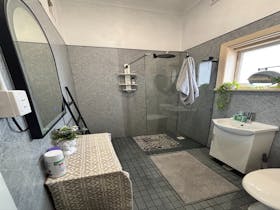 Spacious bathrooms designed for comfort and convenience during your group stay.