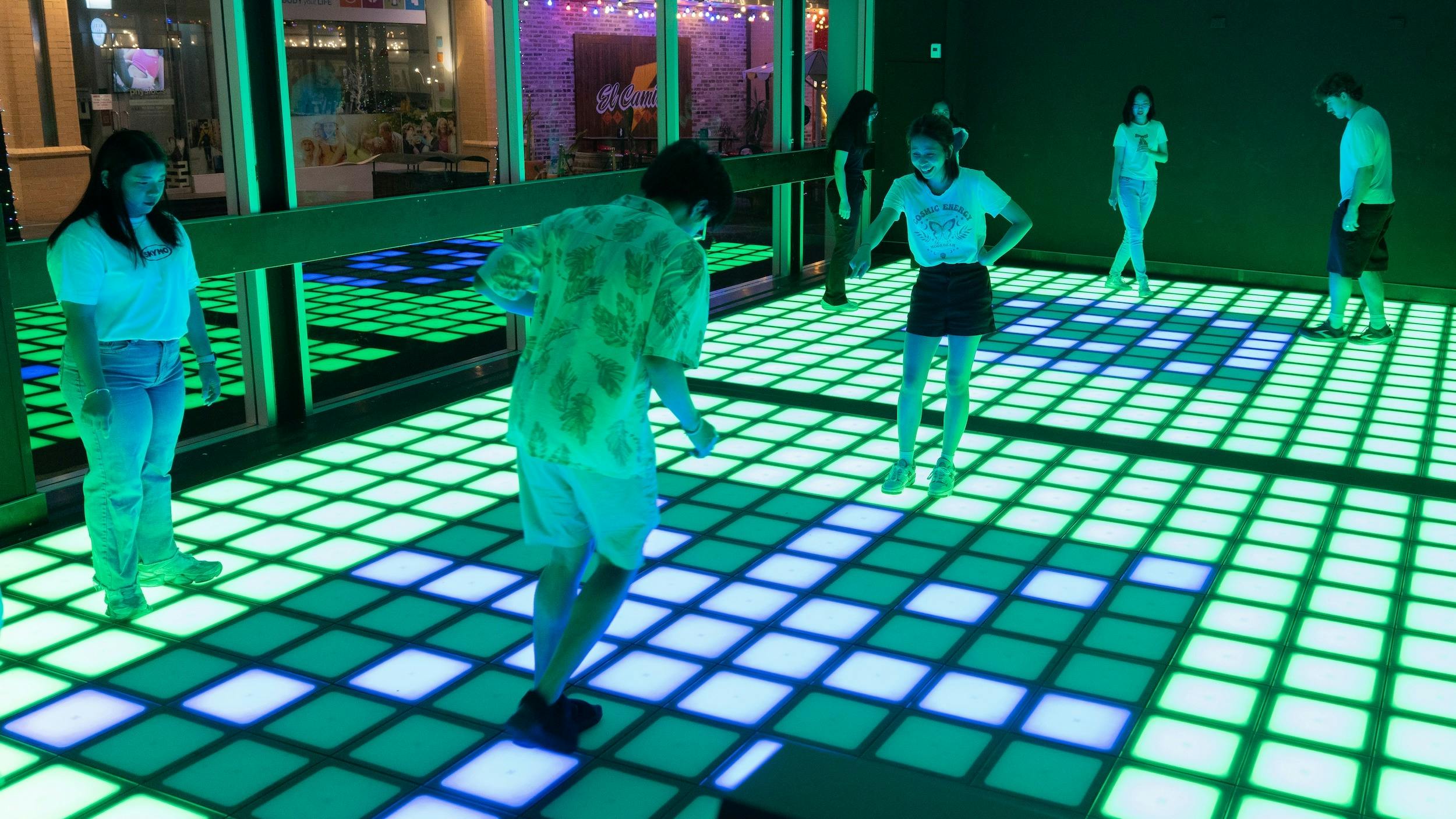 People playing 2 different games of Pixel side by side