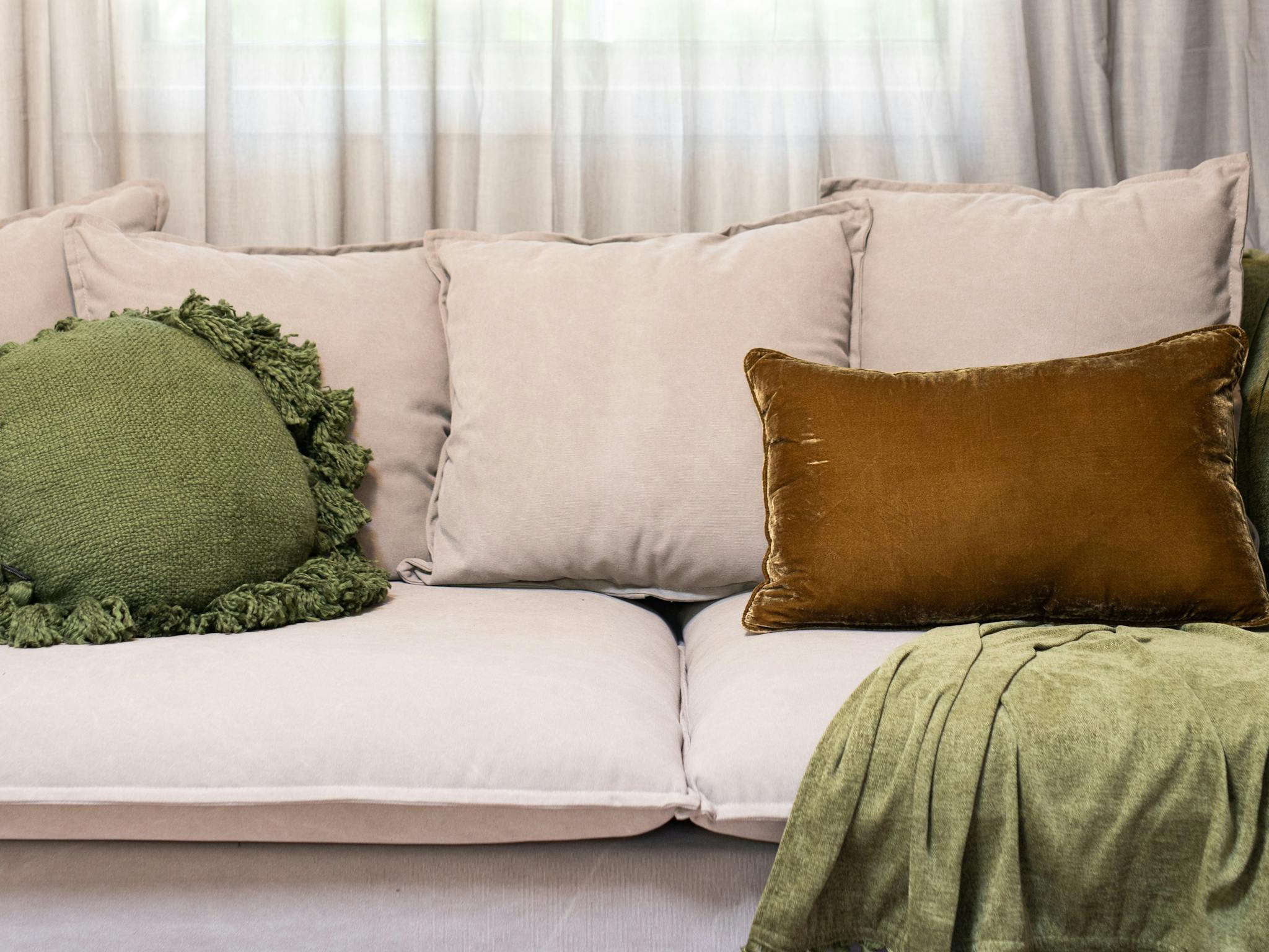 Sumptuous sofa, cushions, throw