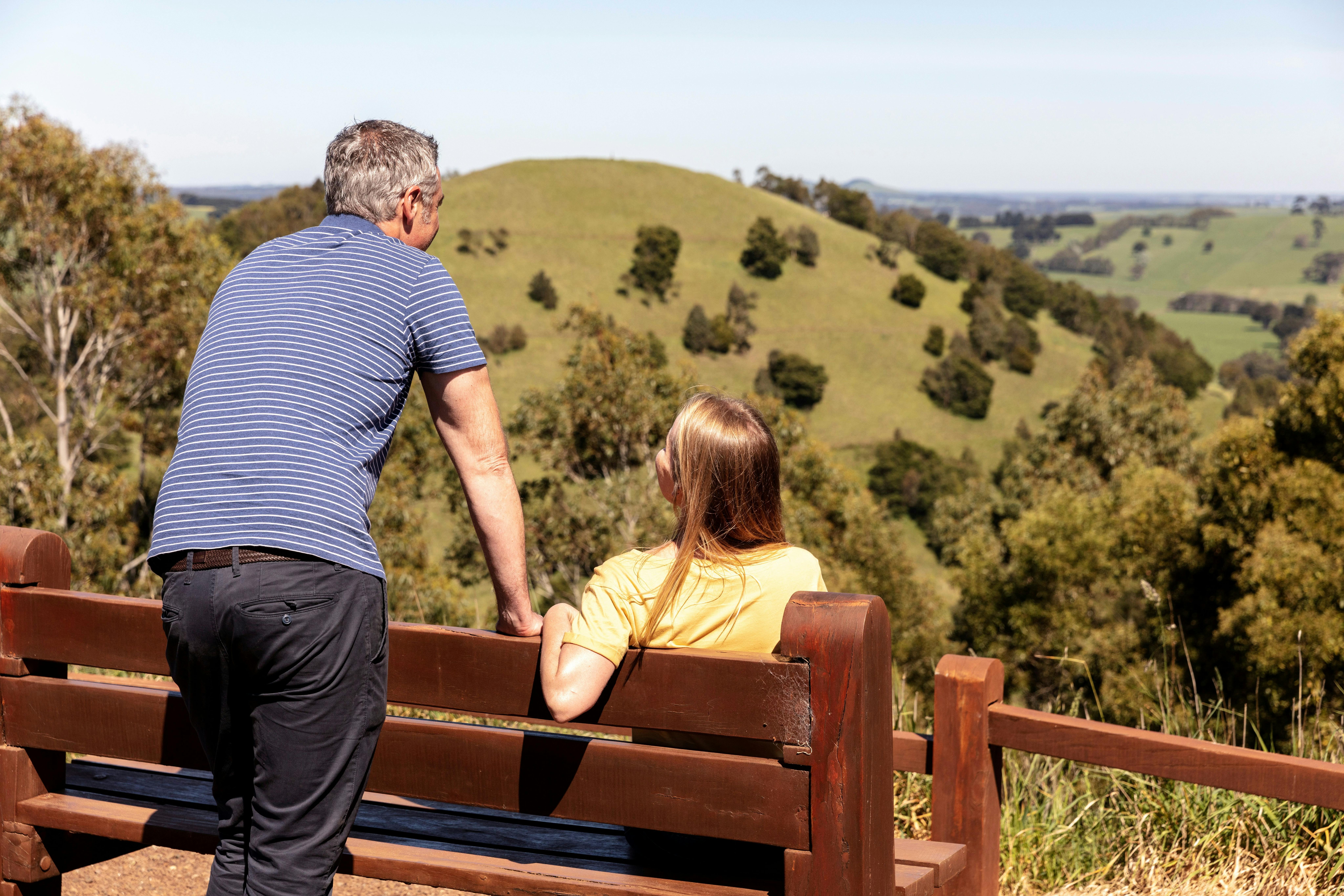 A man and woman appreciating the view from Mt Leura lookout
