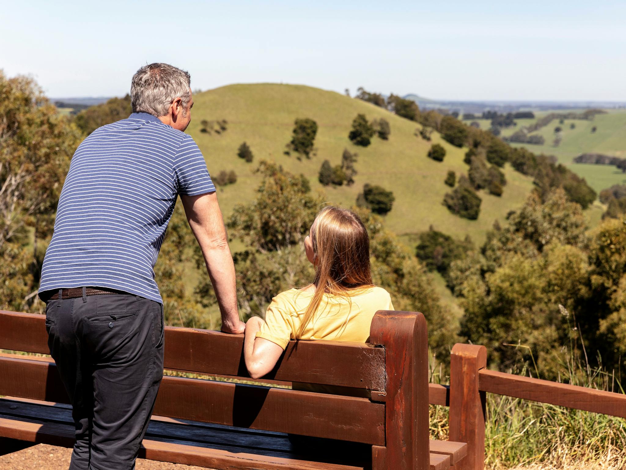 A man and woman appreciating the view from Mt Leura lookout