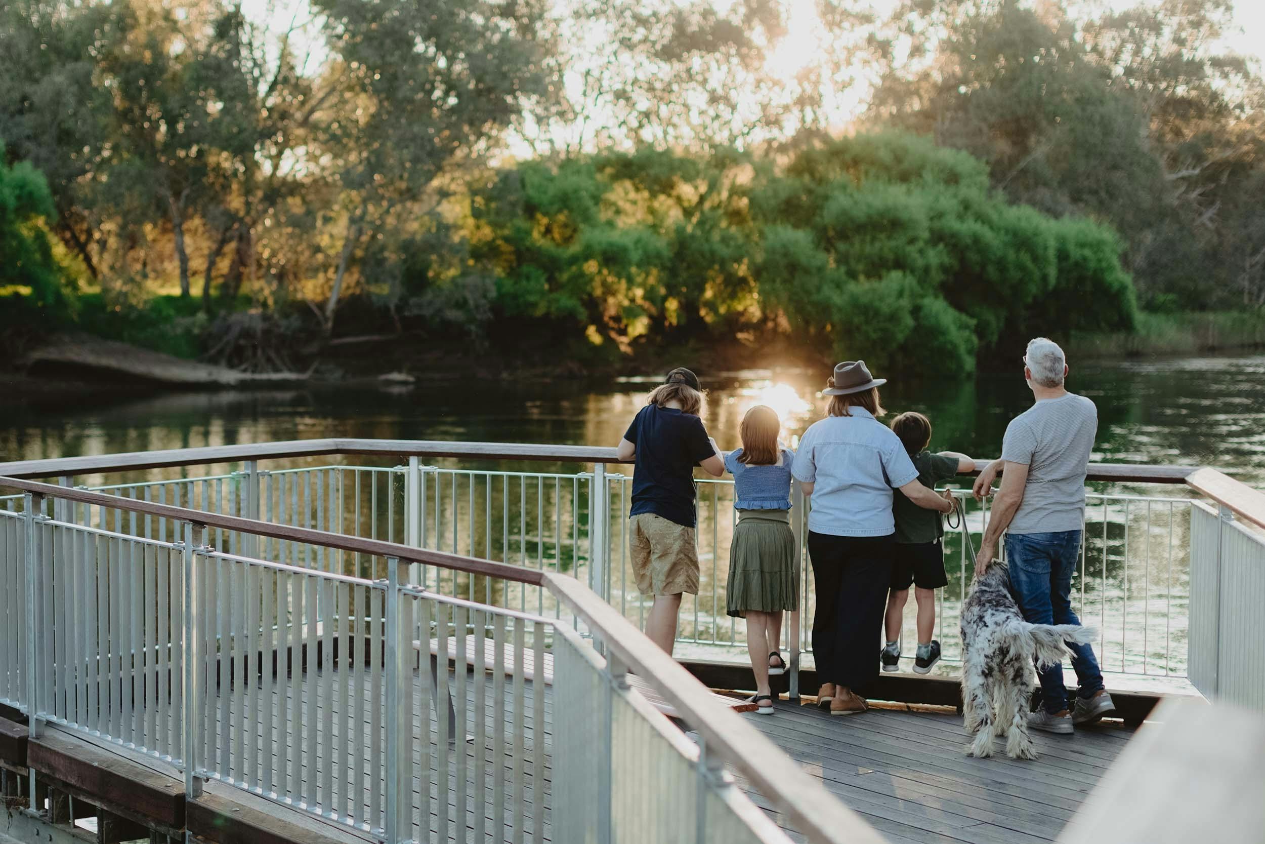 Family enjoy views of the Murray River from the boadlwalk  at the Murray River Precinct