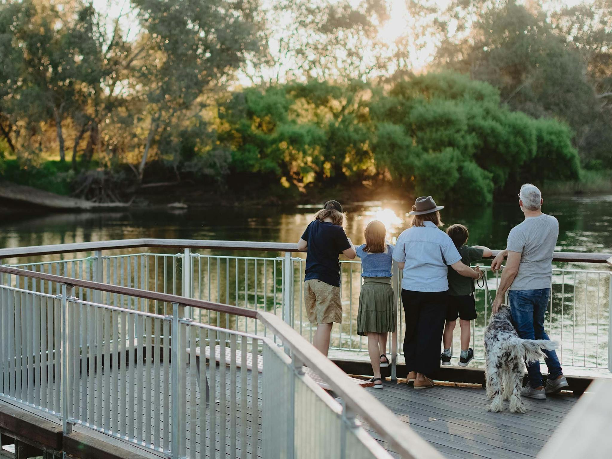 Family enjoy views of the Murray River from the boadlwalk  at the Murray River Precinct