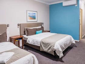 Family-friendly accommodations with clean decor and comfortable bedding options.