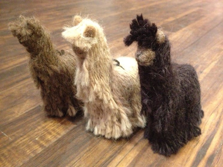 Small toys Needle Felted by hand in the shape of a Suri Alpaca