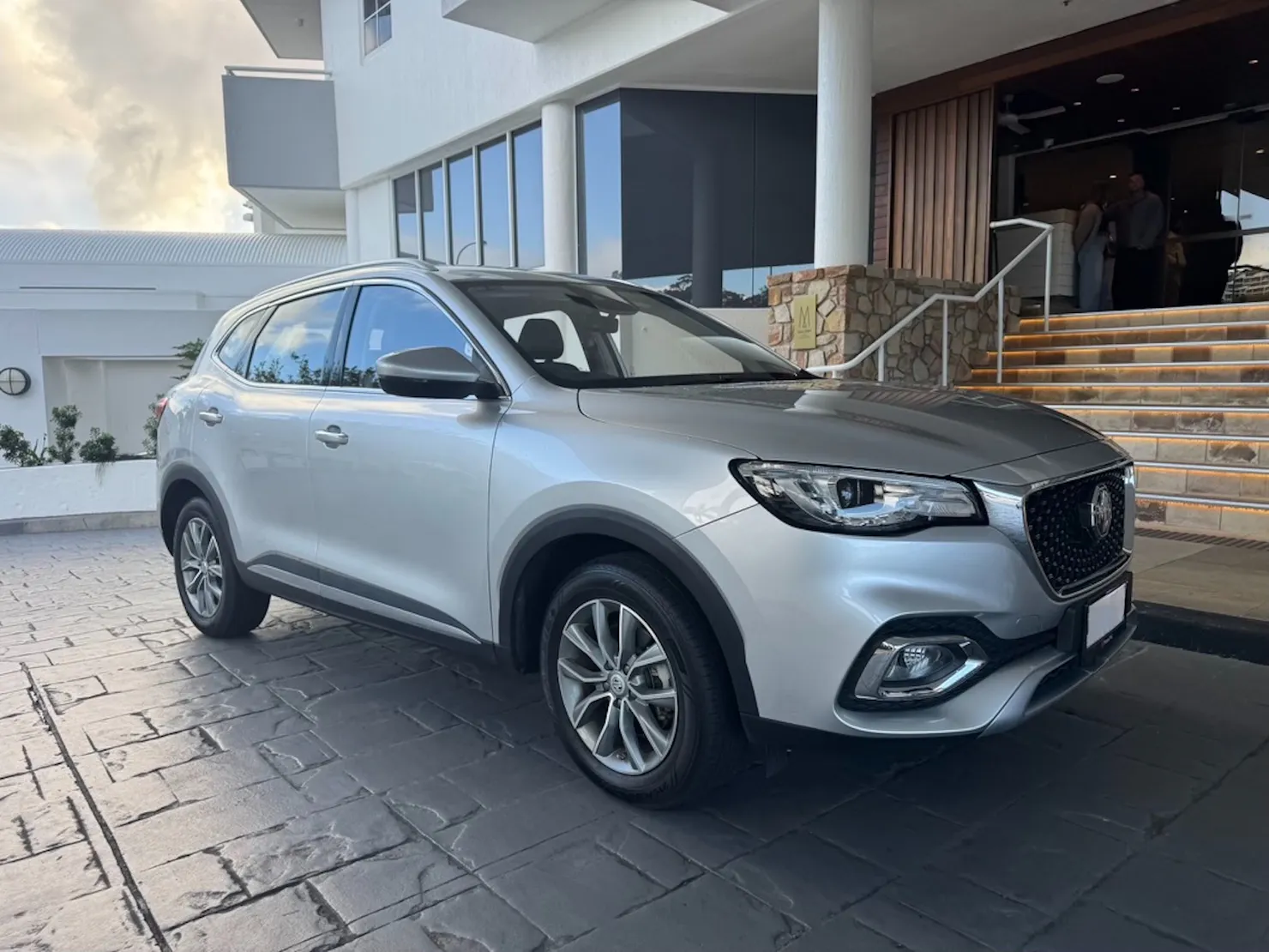 RentaCar Noosa Silver MG HS sport utility vehicle at the entrance to Elysium Noosa