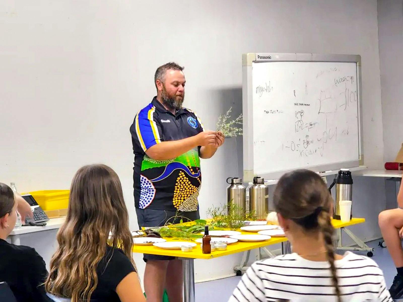 Wiradjuri man Adam Shipp presents to a classroom style audience