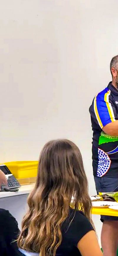 Wiradjuri man Adam Shipp presents to a classroom style audience