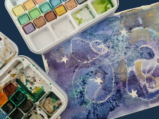watercolour palettes, paint, and star impressions