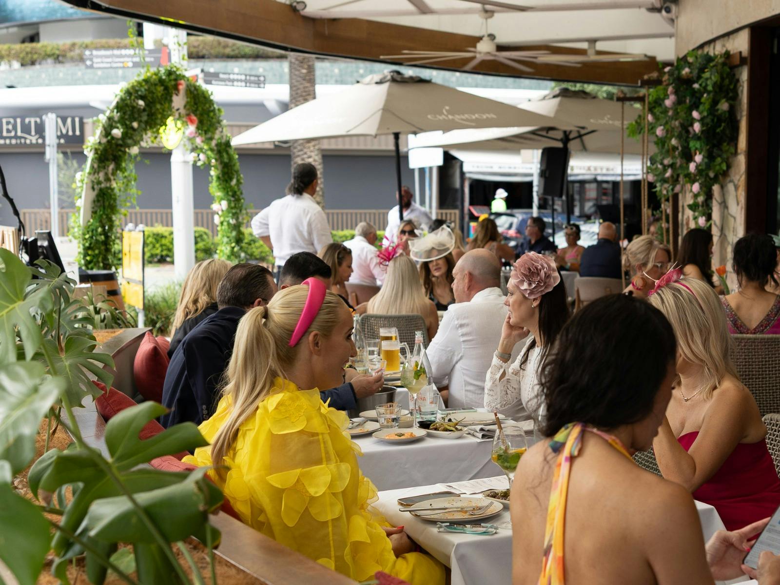 People enjoying a 3 course lunch at Koi while watching the races live from melbourne