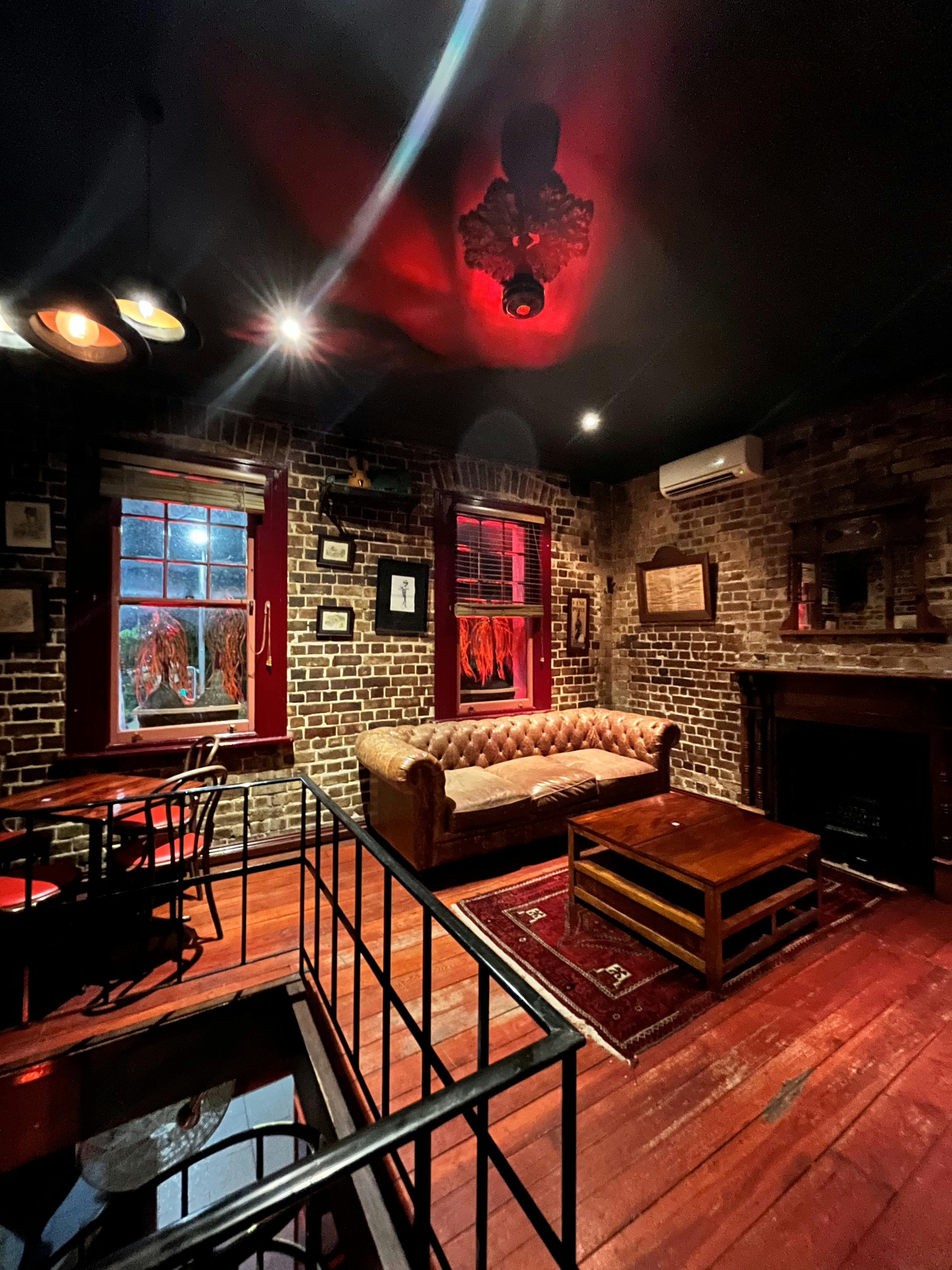 The Drummer's Lounge Room, speakeasy vibes, lounge area, second floor