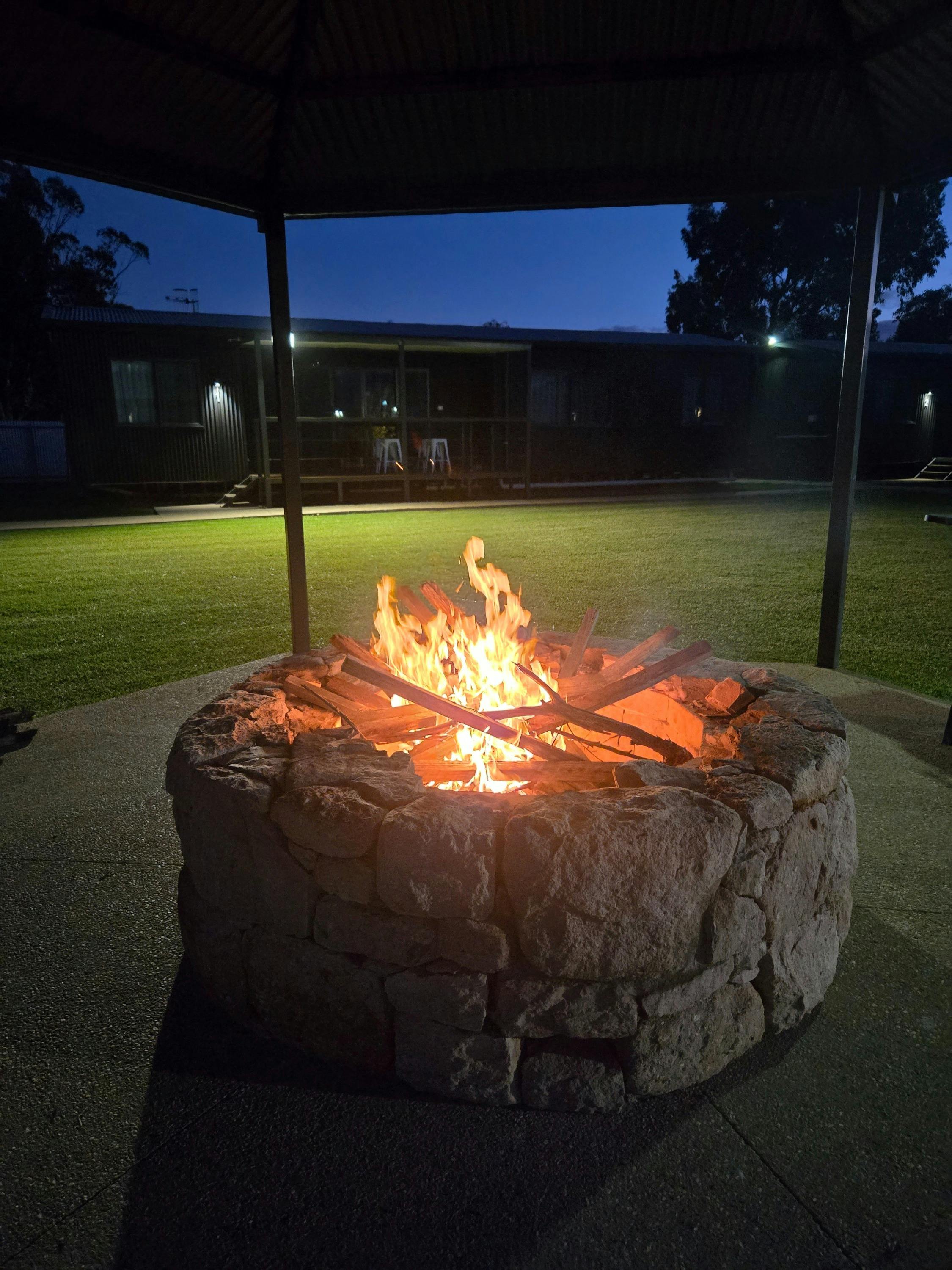 Burning timber in fire pit