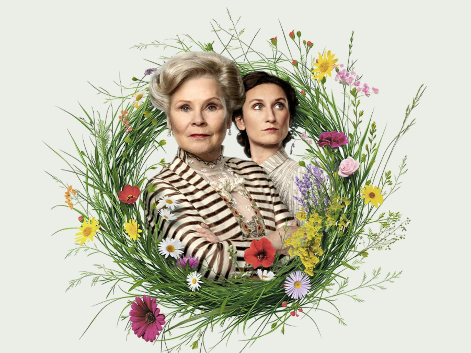 Imelda Staunton & Bessie Carter in a ring of wildflowers