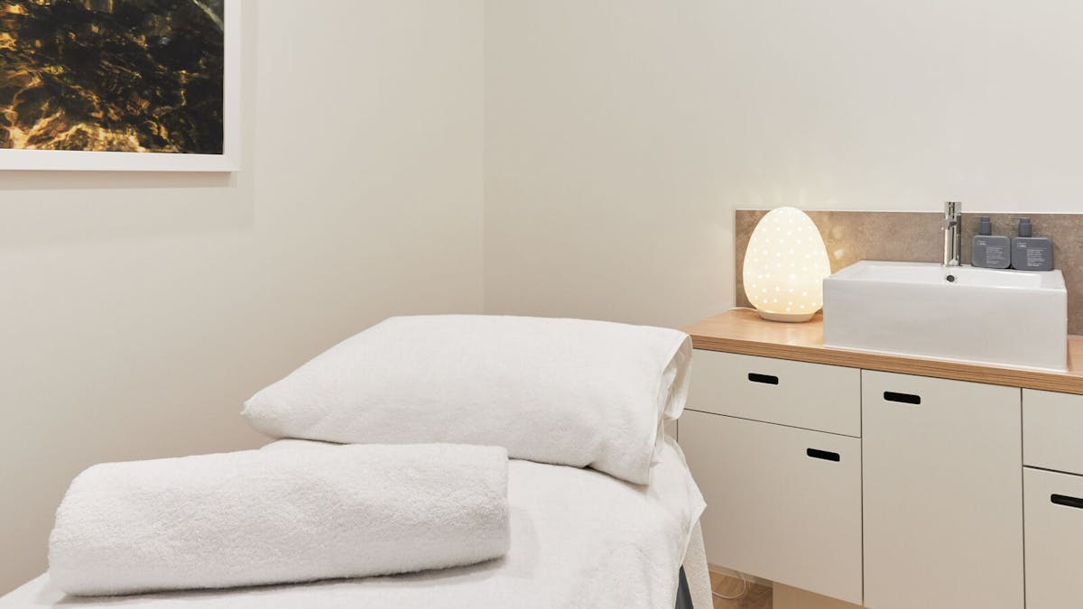 White treatment bed in spa