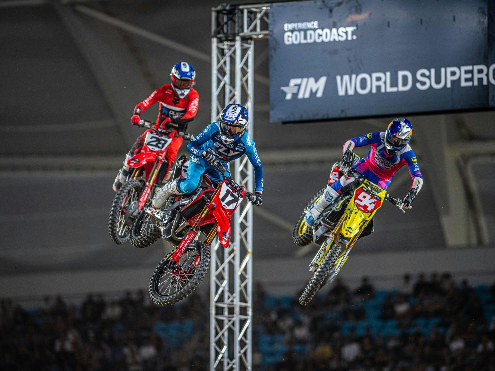 Jump shot of three riders at  2025 World Supercross Championship Australian GP
