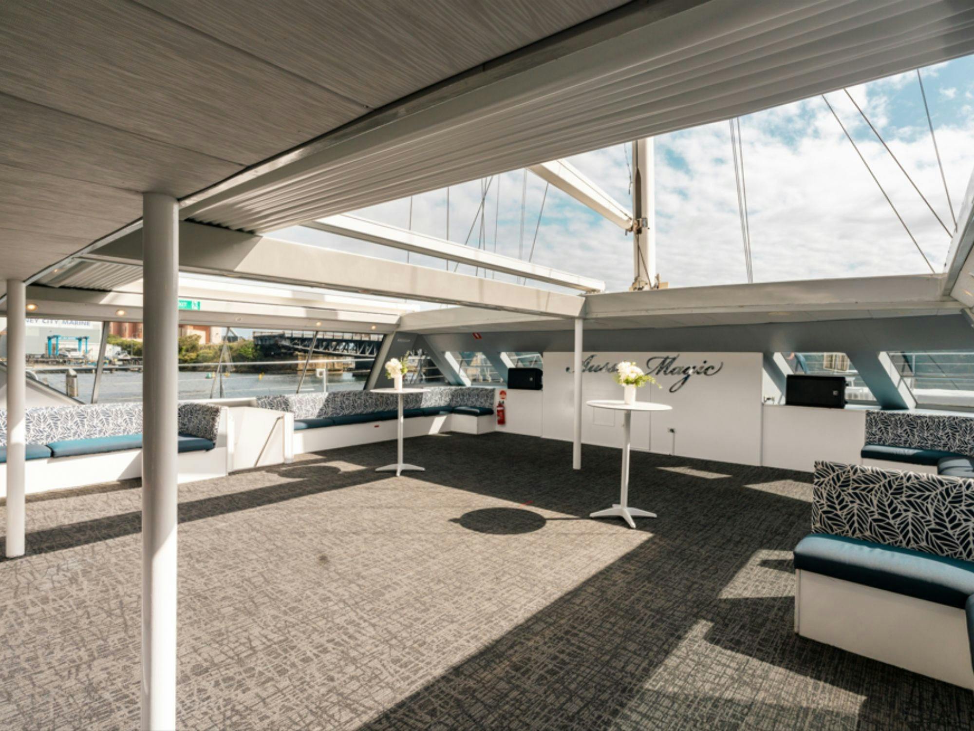 Indoor lounge area of Aussie Magic with the retractable roof open to the sky