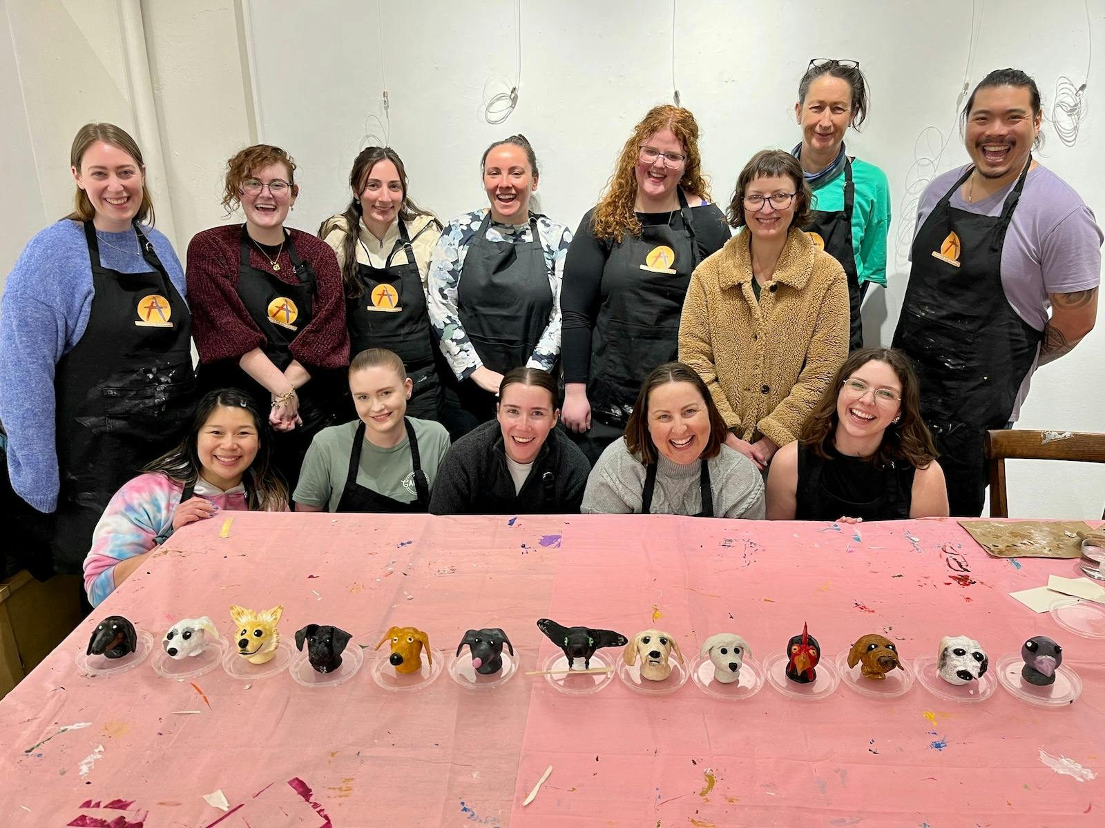 Workshop participant with finished scuptures