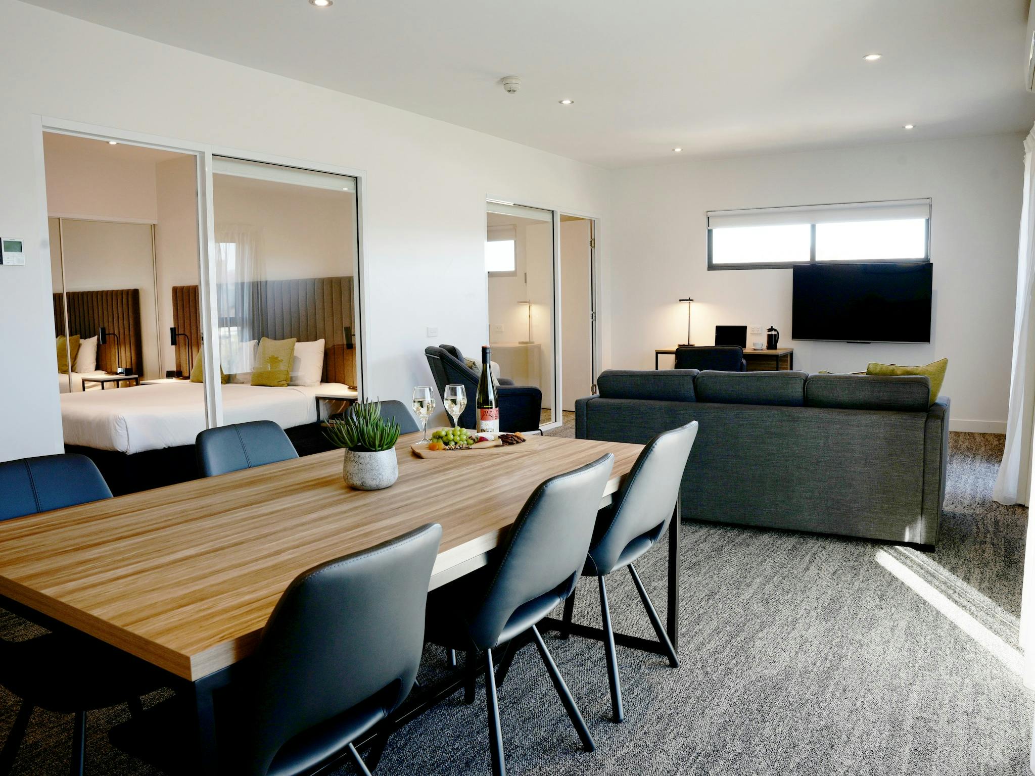 A shot of our larger apartment living areas, with open-plan dining and lounge areas