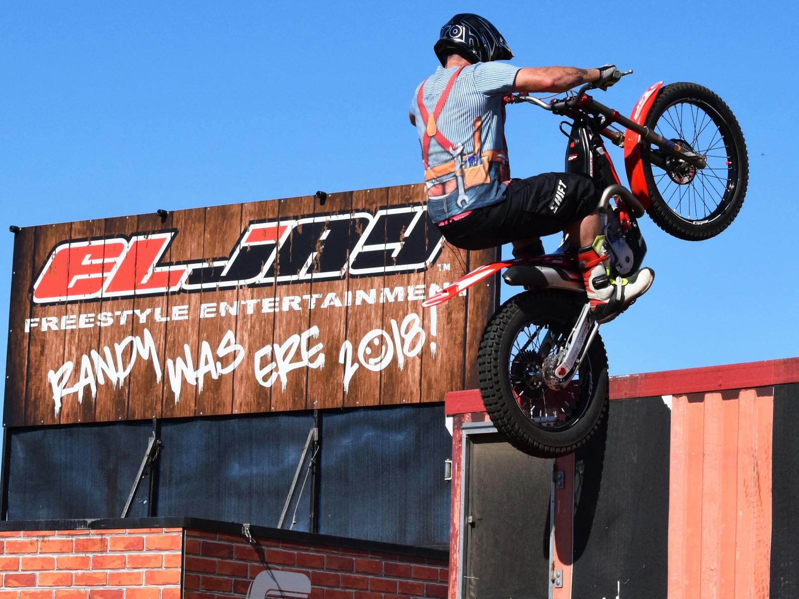 Man doing trick on motor bike