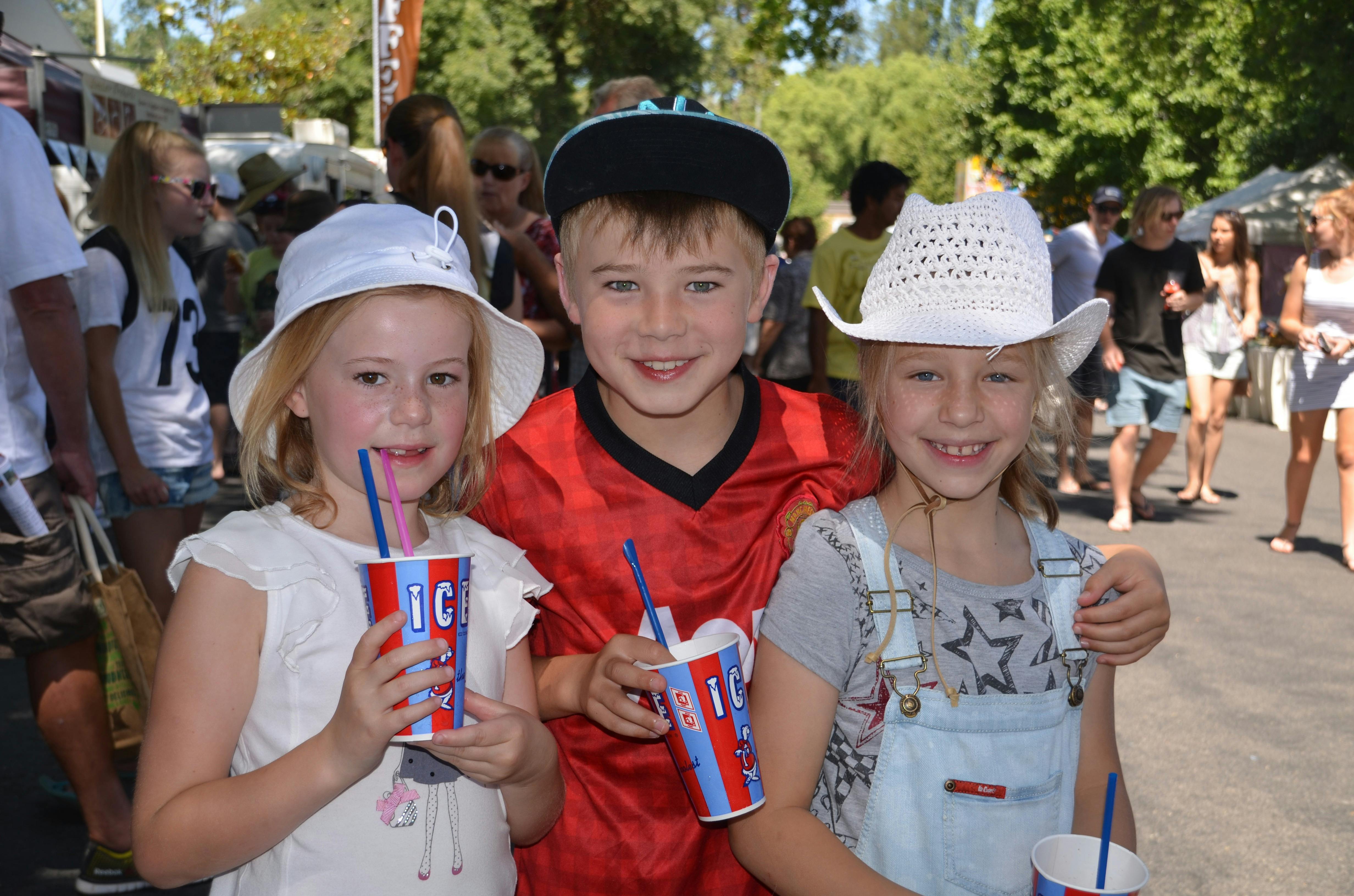 Three children with drinks