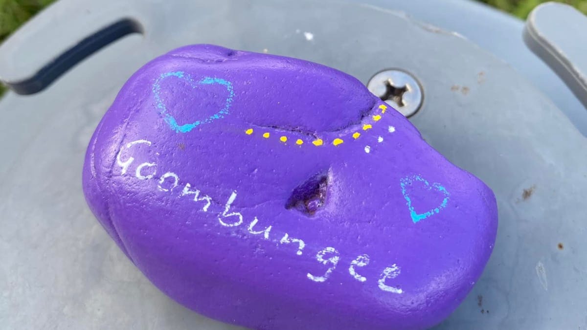 Painted rock with love Goombungee as part of painted rock collection around town