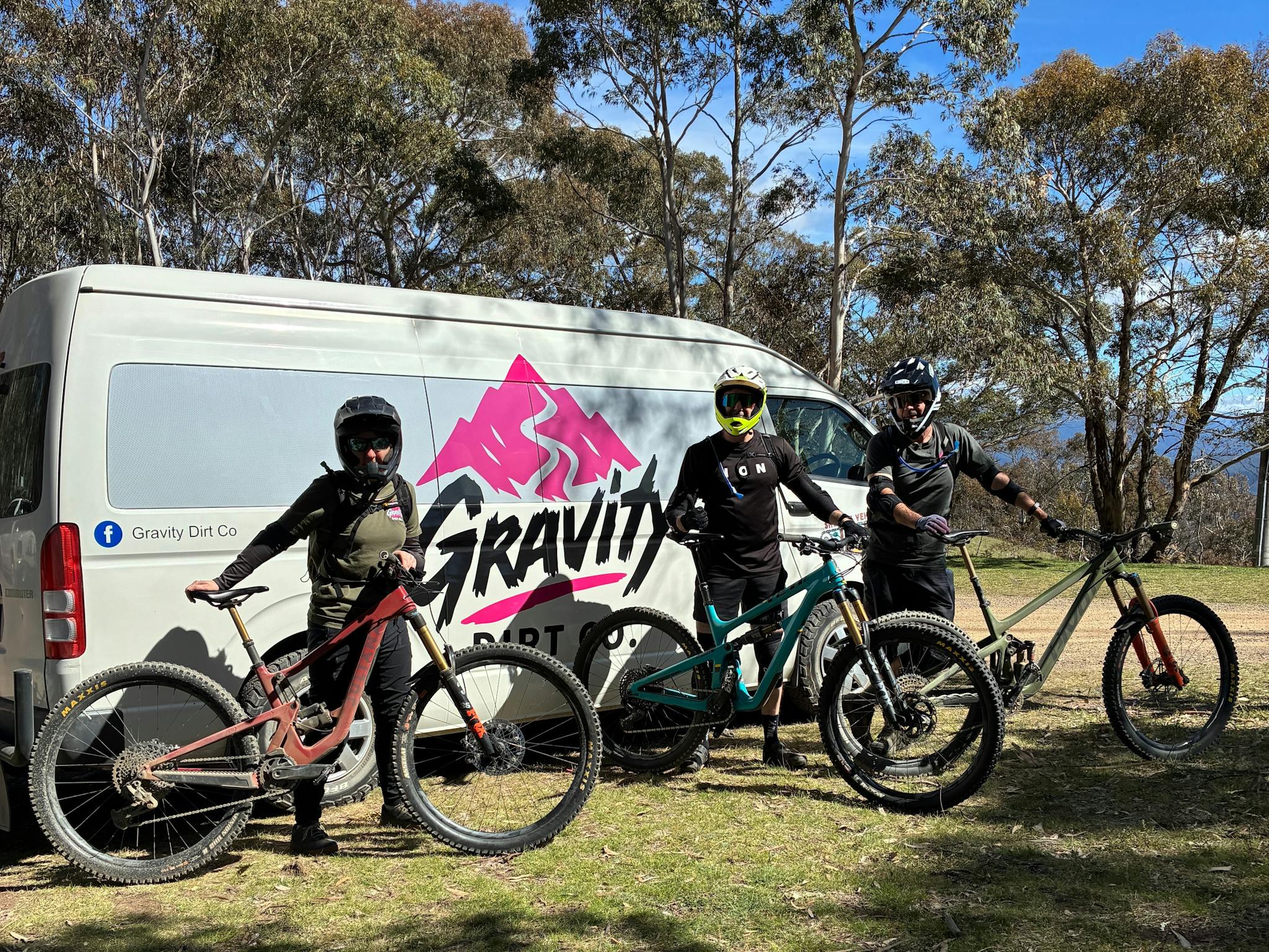 Happy riders at the Gravity Dirt Co. trailhead drop off.