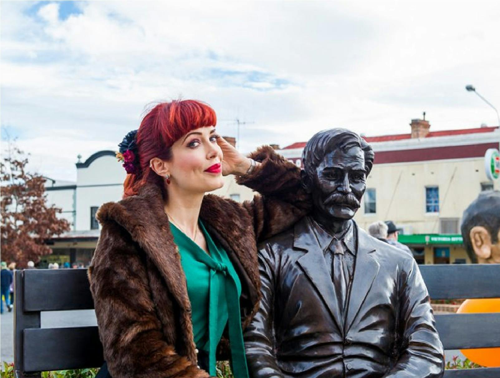 picture of the henry lawson statue with Tara Moss