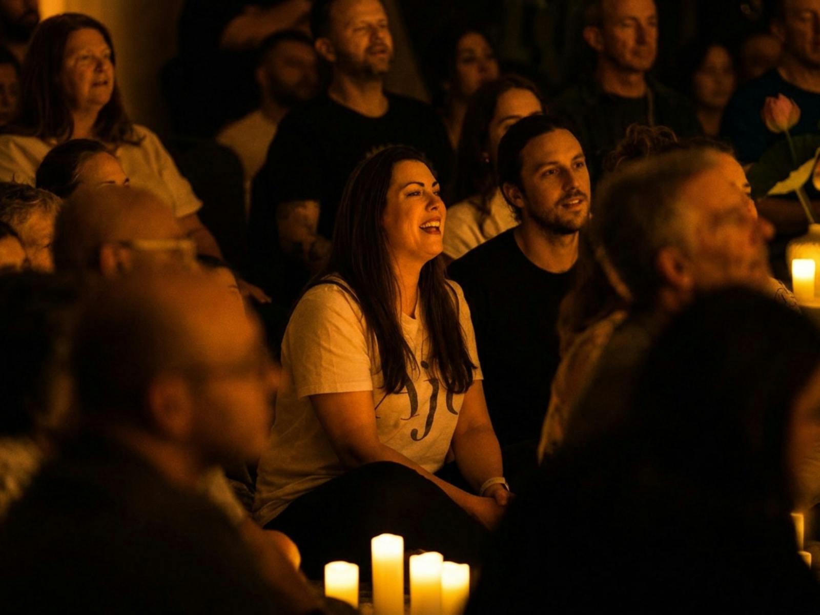 Woman smiling in a crowd