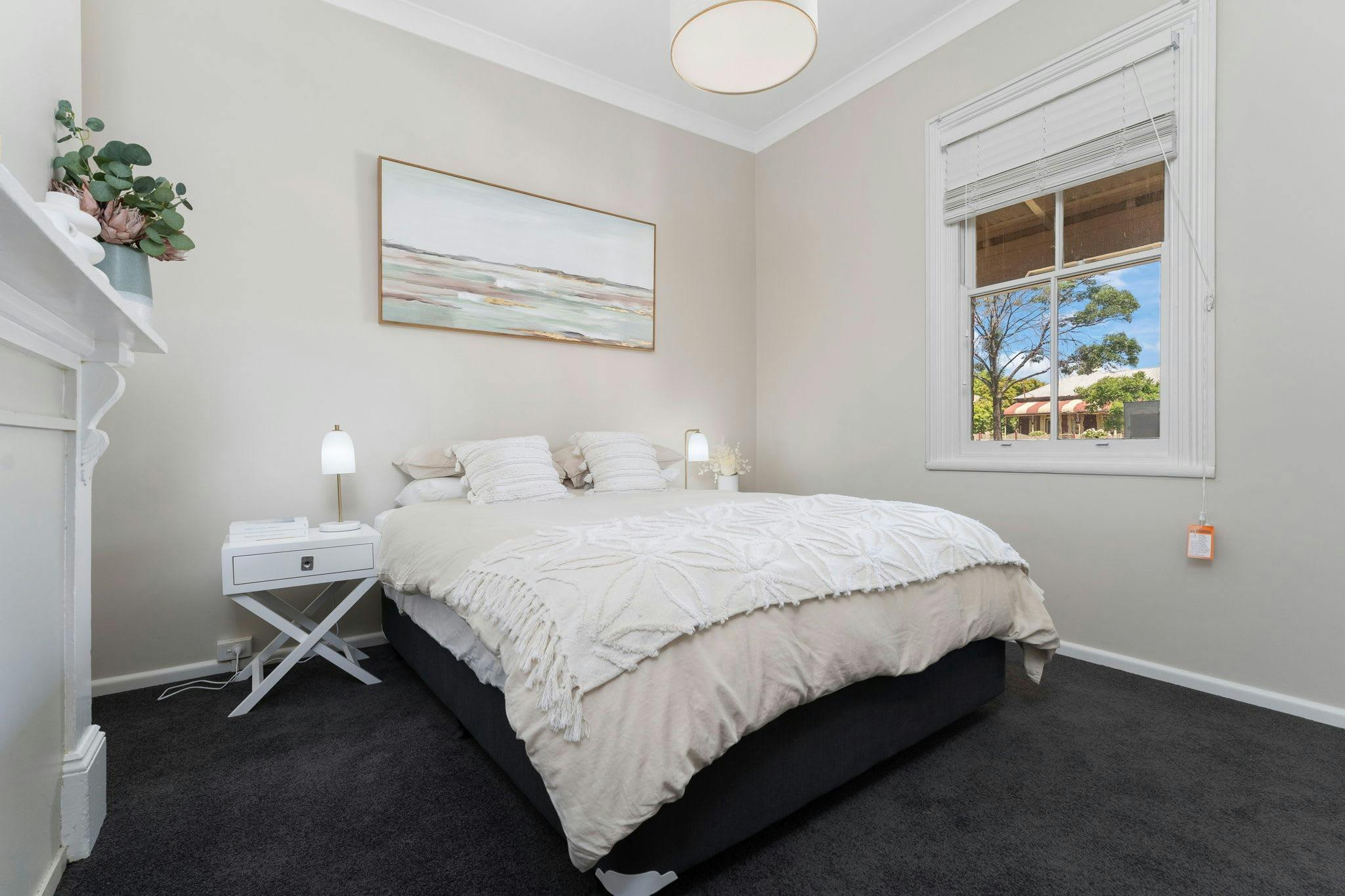 Large spacious bedroom with window